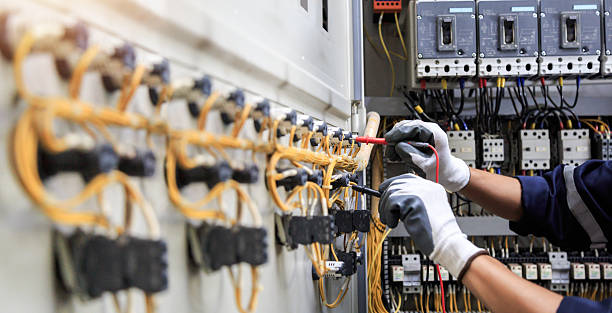 Professional Electrician technician working in Townsend, DE